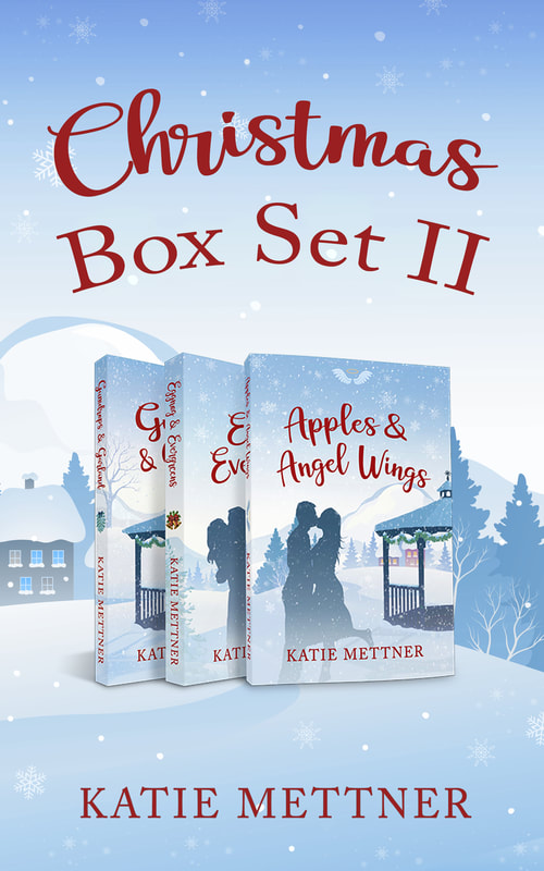 The background is an illustrated Christmas town scene with snowflakes falling. The top says, Christmas box set II. Katie Mettner. In the center are three paperbacks for  Apples and Angel Wings, Eggnog and Evergreens, and Gumdrops and Garland.