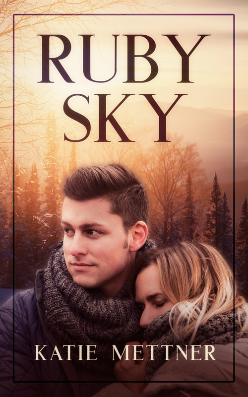 The backgrouns is a forest of trees with a sunset. There is a couple in an protective embrace. They are both wearing a winter coat and scarves and the woman's face is turned away from the camera. It says, "Ruby Sky, Katie Mettner"